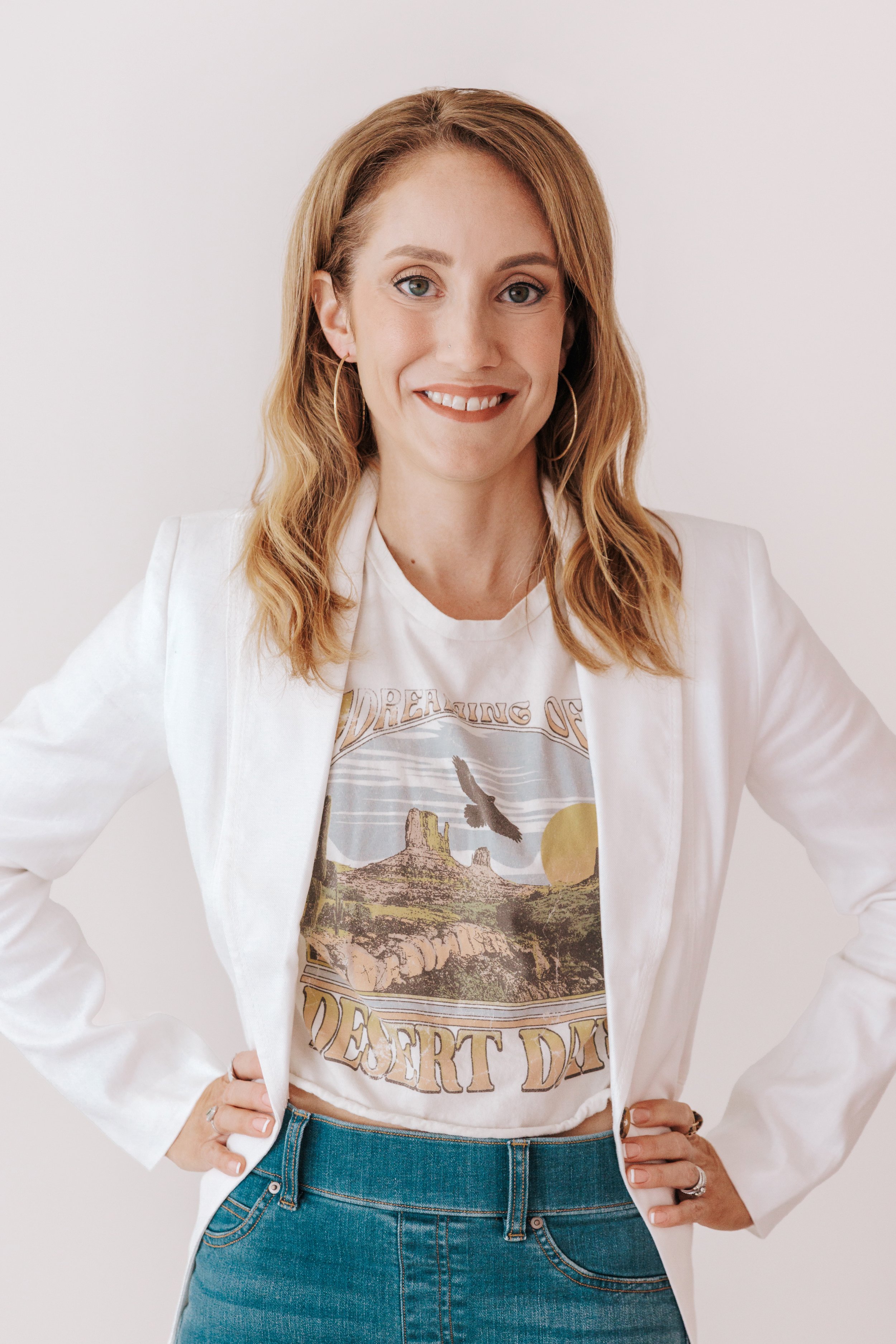 Jenn smiling in blazer