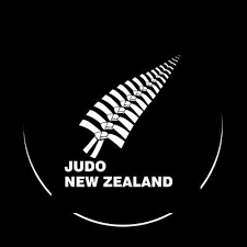 A logo for Judo New Zealand featuring a stylized depiction of a judo belt and the organization's name.