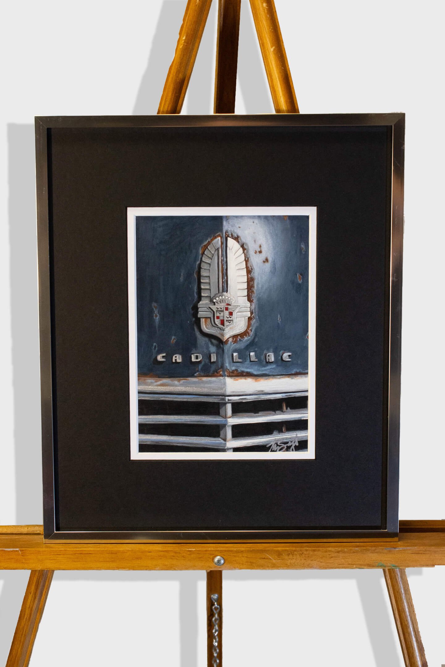 cadillac fine art drawing in frame on easel.jpg