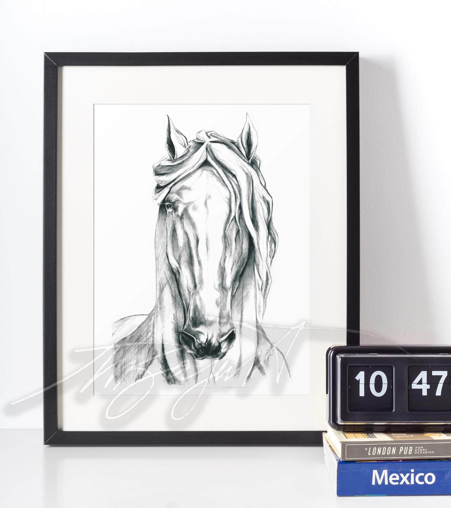 horse black and white drawing in frame on table.jpg