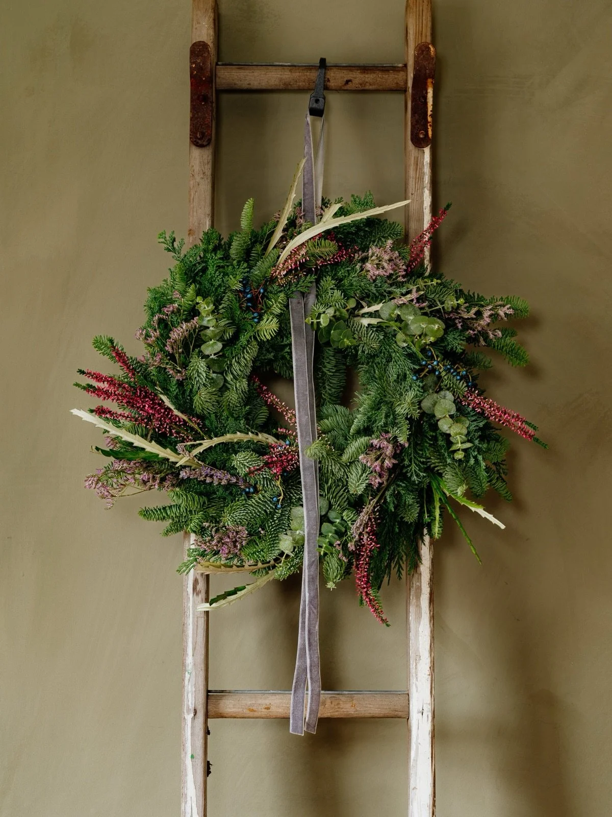 You&rsquo;re loving our winter foliage wreaths - and we are too.
Washed in dreamy purples and pinks, each one features lush,aromatic evergreen foliage and finished with a luxurious velvet ribbon for that wild moorland feel. 

Our wreaths are availabl