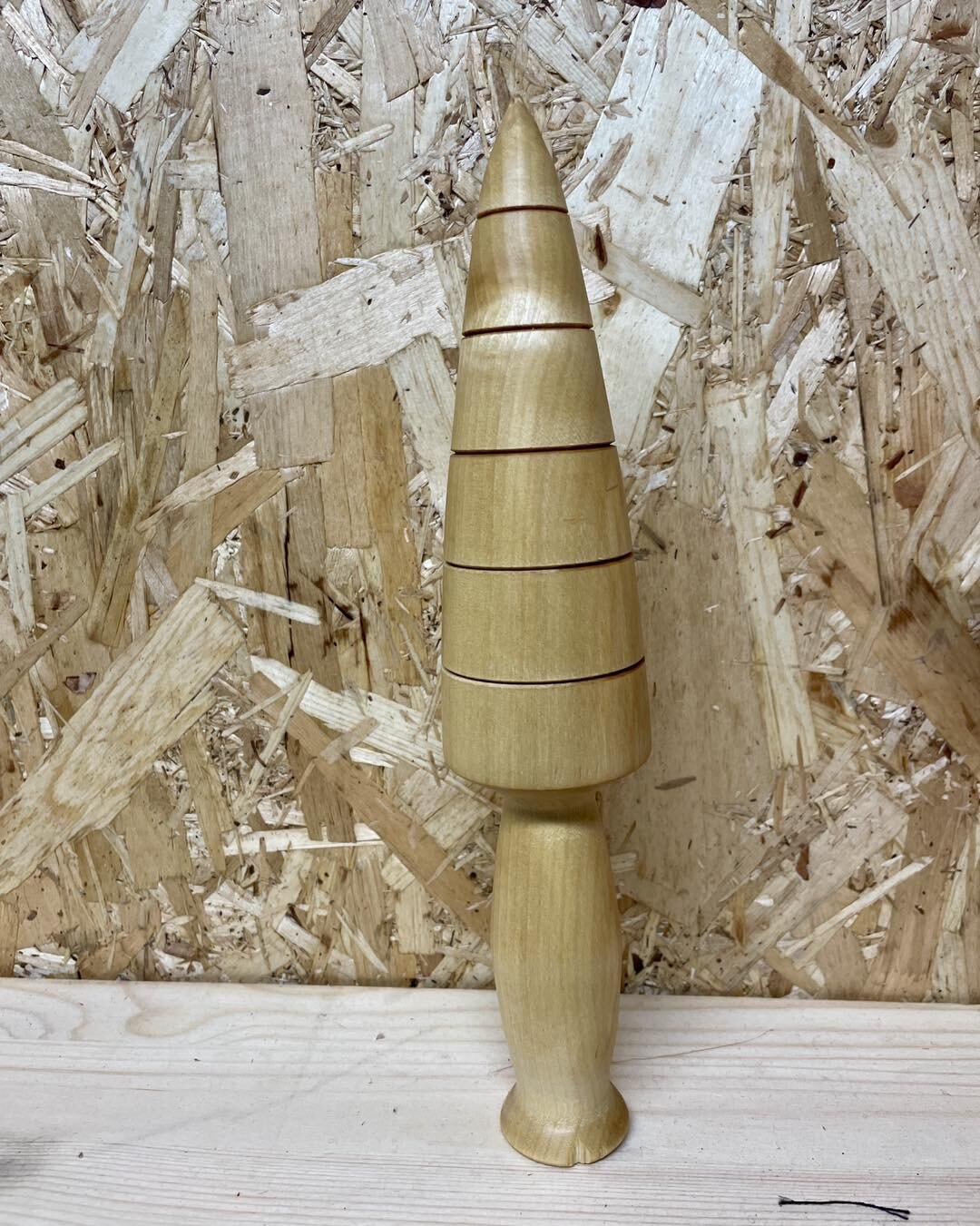 Not directly archery related, and I forgot to take pictures during the making process. But I turned a garden dibbler. It is a tool to help during planting, by pushing the earth to the sides rather than hollowing it out. The markes are spaced an inch