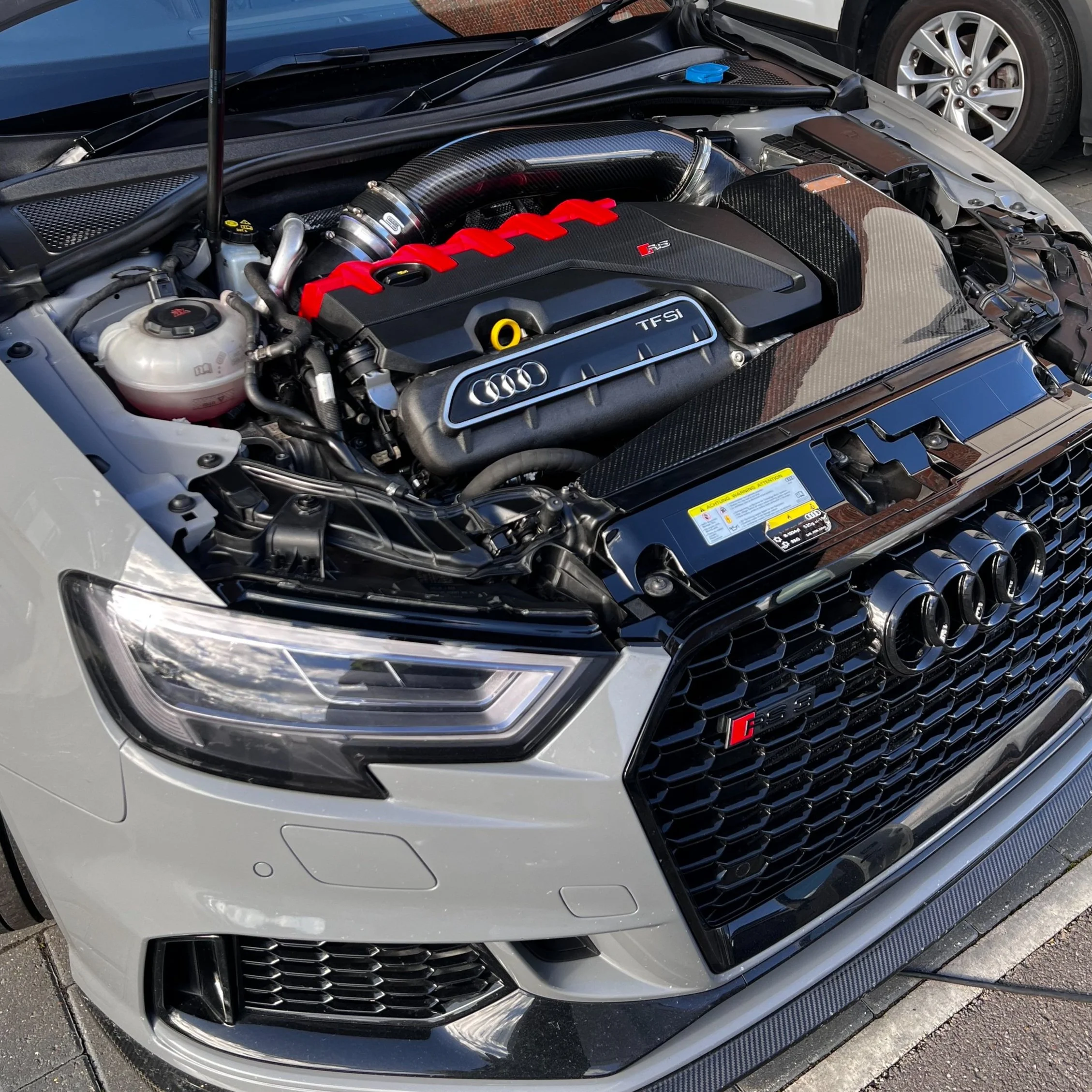 Audi engine with grille and logo
