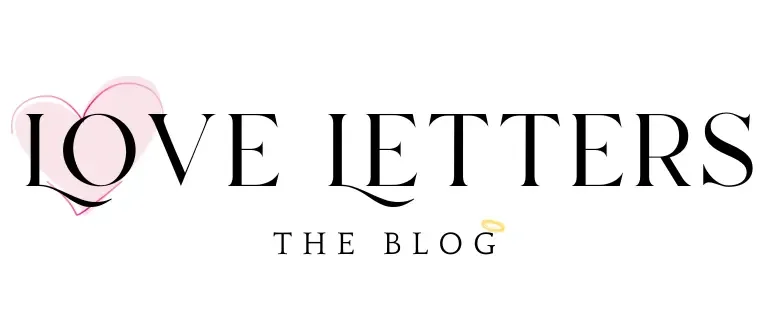 The image displays the text "LOVE LETTERS THE BLOG" with a pink heart outline overlapping the letter 'O' in 'LOVE' and a small golden halo on the letter 'G' in 'BLOG'.