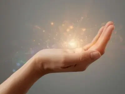 Hand holding energy ball