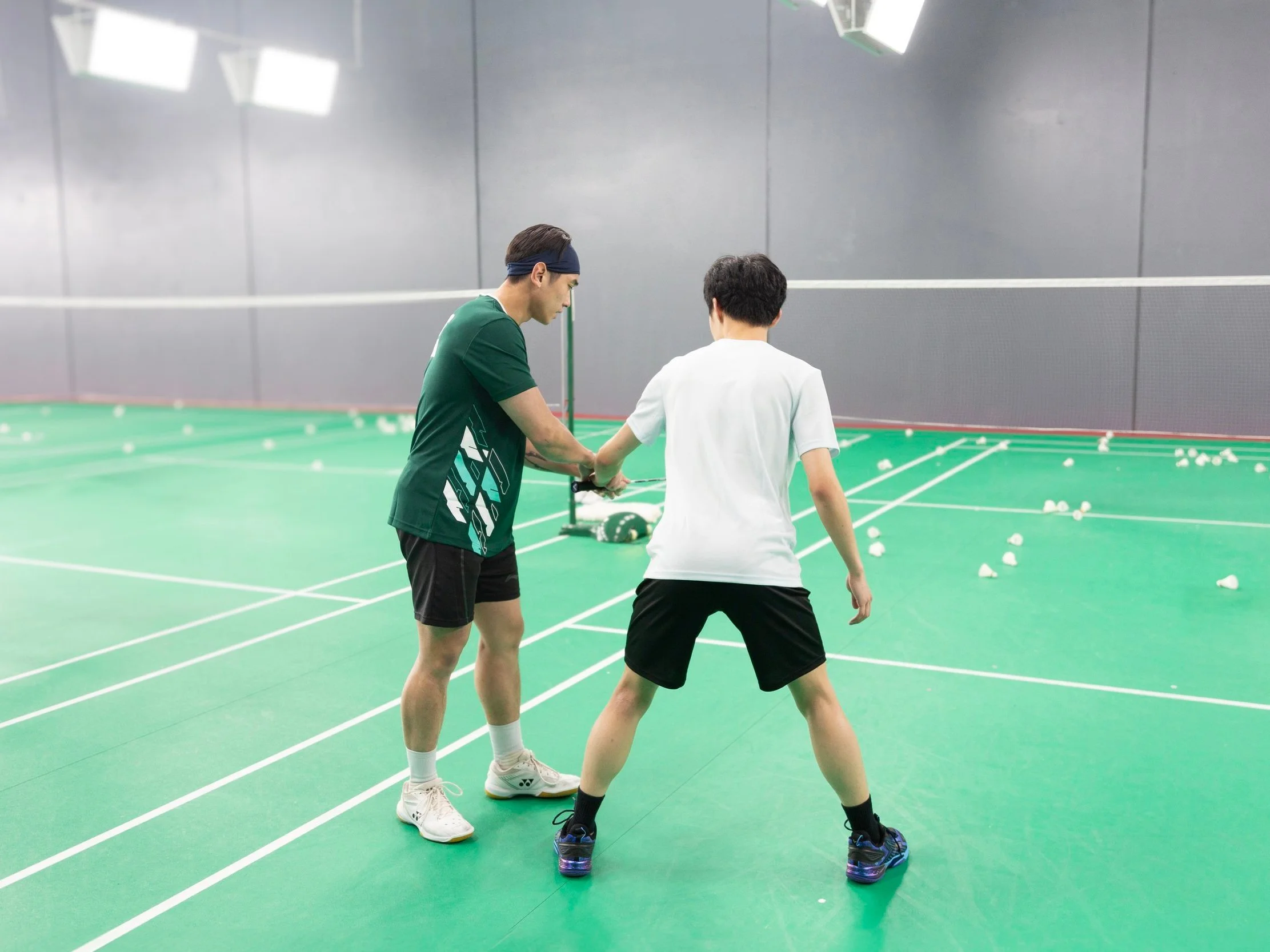 Elite Athlete Academy coach training a junior badminton player on court in Ravenhall, Melbourne