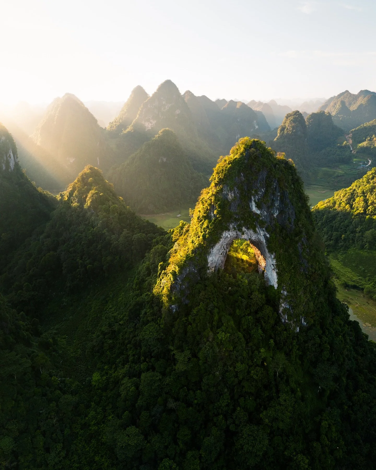 Vietnam&rsquo;s Angel Eye Mountain looks almost unreal, with a massive hole cutting right through the mountain. It&rsquo;s not only an iconic spot but also surrounded by breathtaking scenery with hundreds of karst peaks all around. I flew my drone th