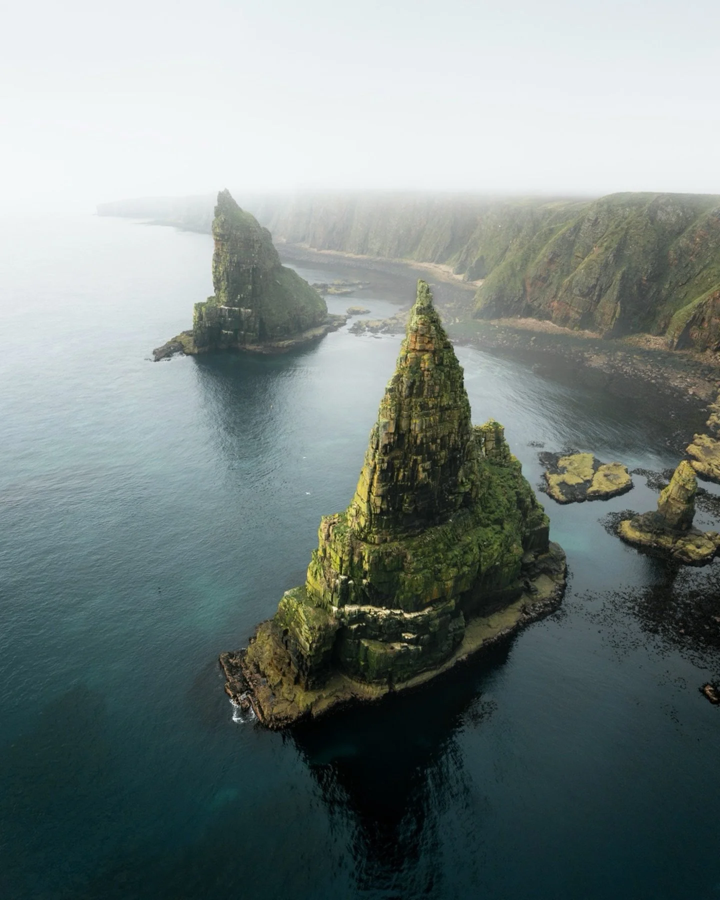 Up in the north of Scotland, there&rsquo;s one of my favourite places, with steep cliffs and towering sea stacks. We arrived there tired after a short night and an early start, and were completely stunned by the view. It almost felt like a dream.
&md