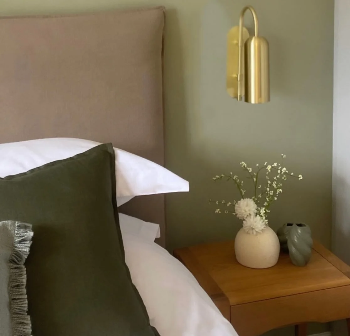 Exploring the balance between warm metals and muted green tones 🌿

#interiordesign #bedroomdesign #modernorganic 
#calminteriors #softminimalism #designinspo 
#homedesign #interiordetails #neutralinteriors 
#emmarossiterdesign