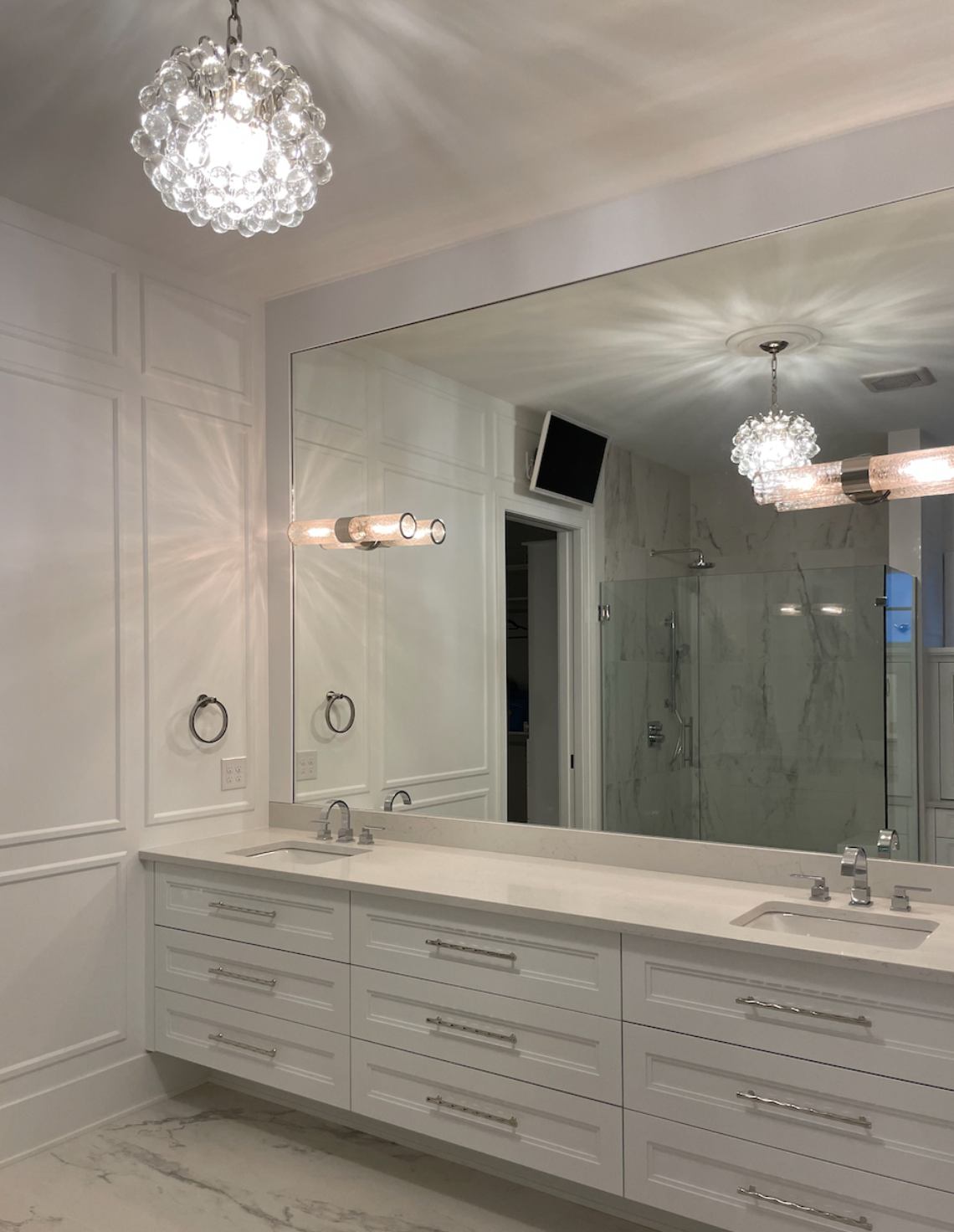 Extra large luxurious master bathroom designed by Interiors by Holly