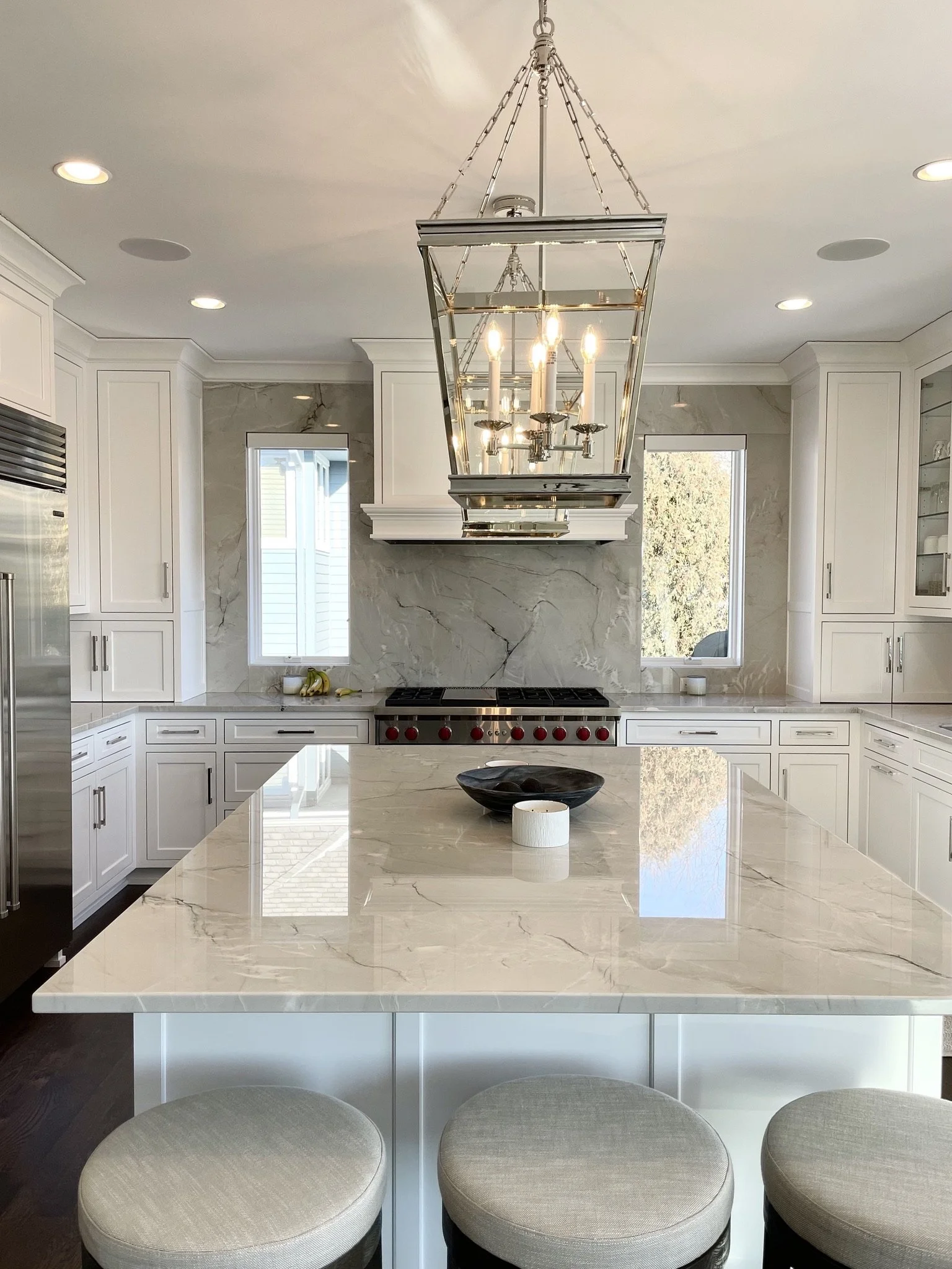 Custom marble kitchen designed by Interiors by Holly