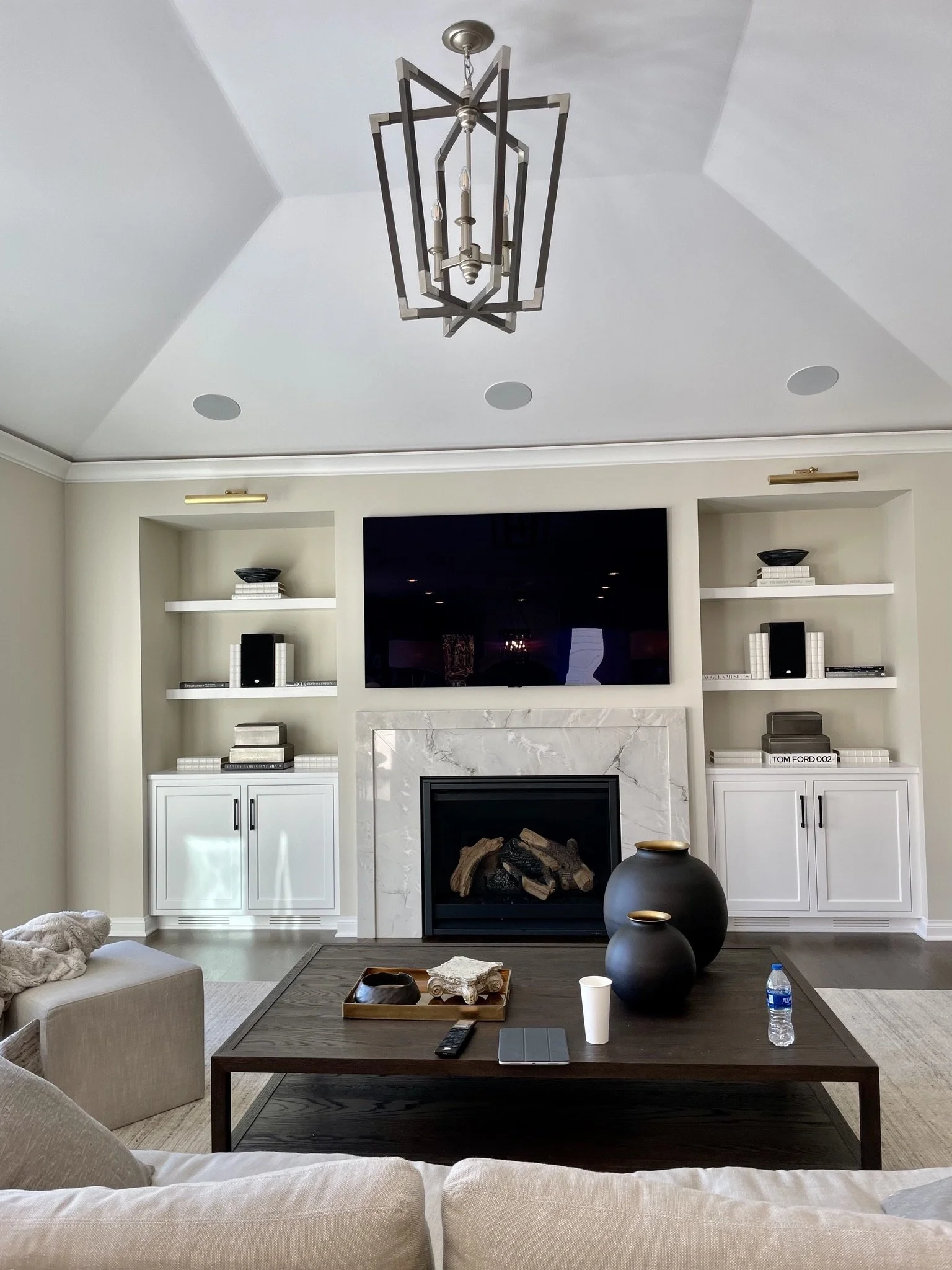 Living room and fireplace custom designed by Interiors by Holly