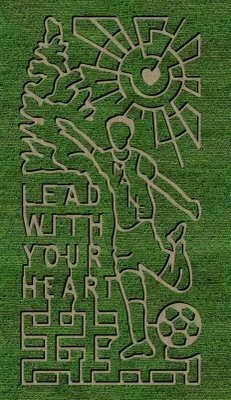 A logo with a football player kicking a ball, a sun with rays, a maze, and the text 'Lead with your heart' on a green background.