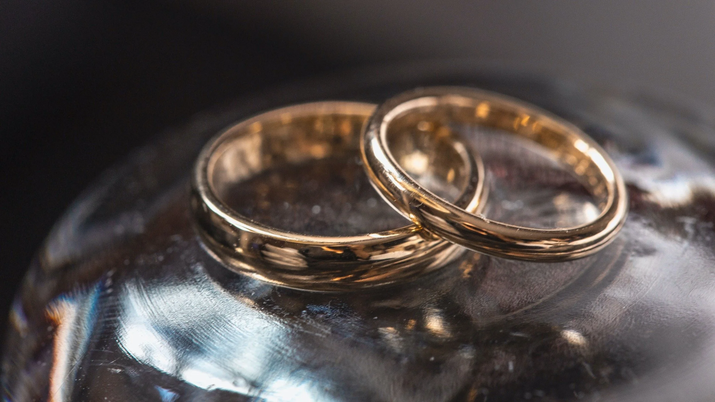 Two vintage gold wedding rings before the ceremony. 