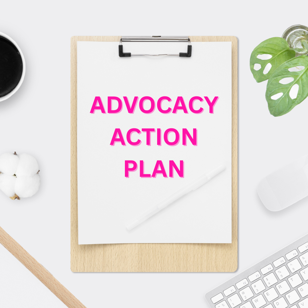 A clipboard with a paper that has bold pink text saying "Advocacy Action Plan" on a white desk. Surrounding items include a small black cup, a cotton ball, a green monstera leaf, a white computer mouse, and a partial white keyboard.