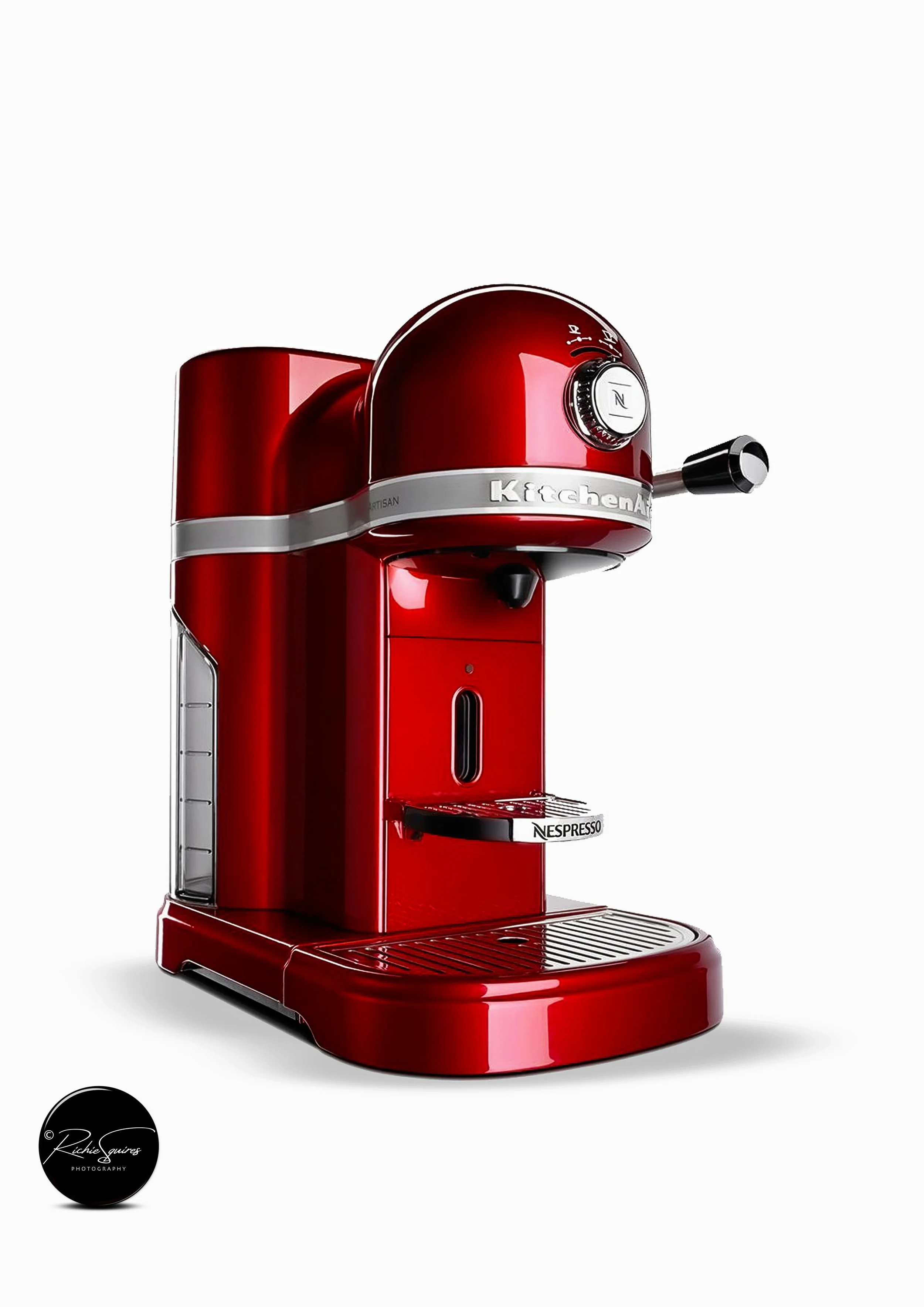Red KitchenAid Nespresso coffee machine on white background.