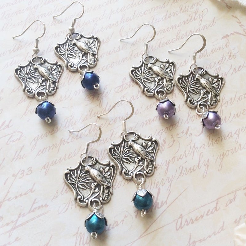 silver bird earrings.jpeg