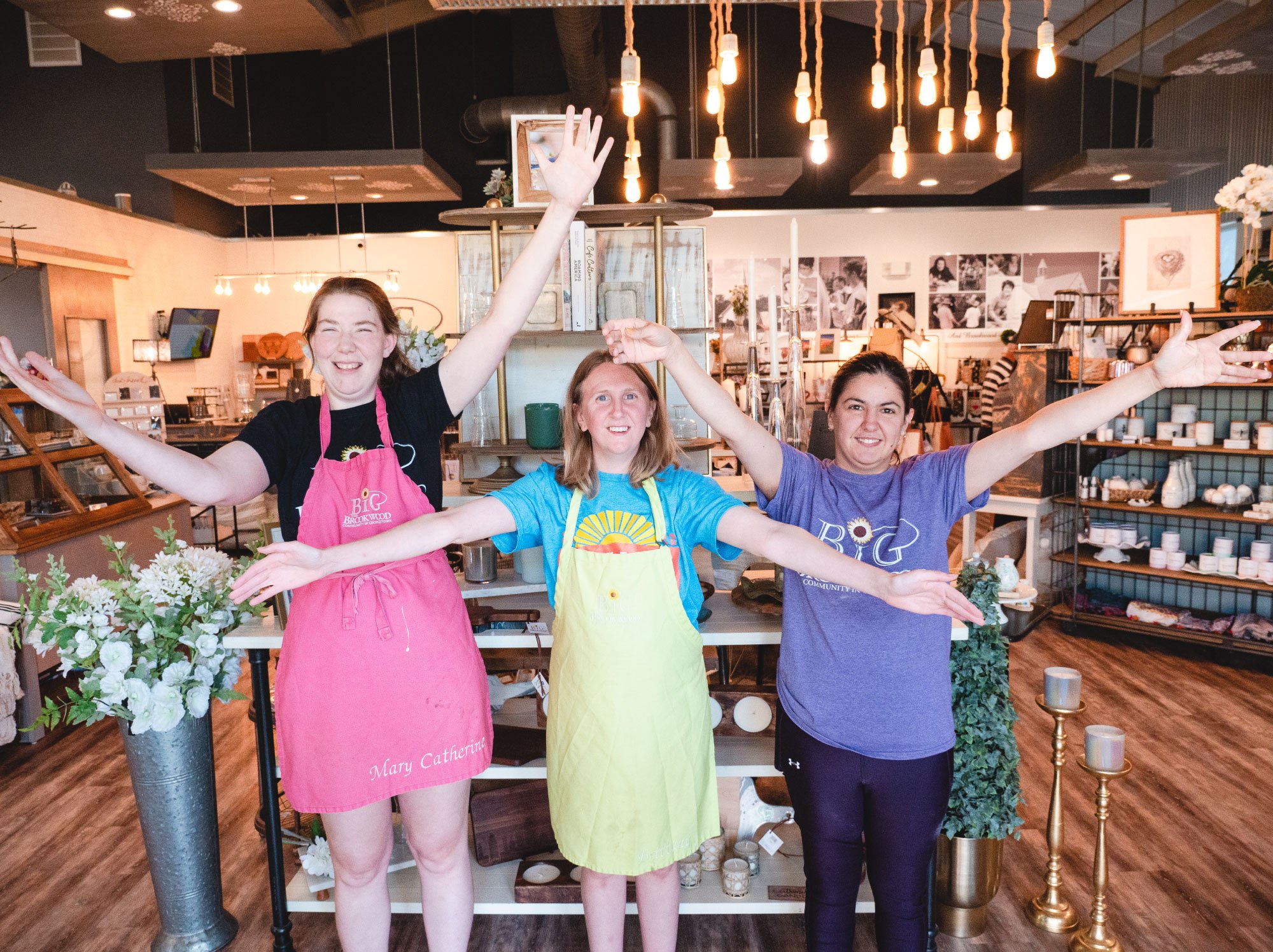 3-BiG-workers-in-the-Shop-welcoming-visitors.jpg