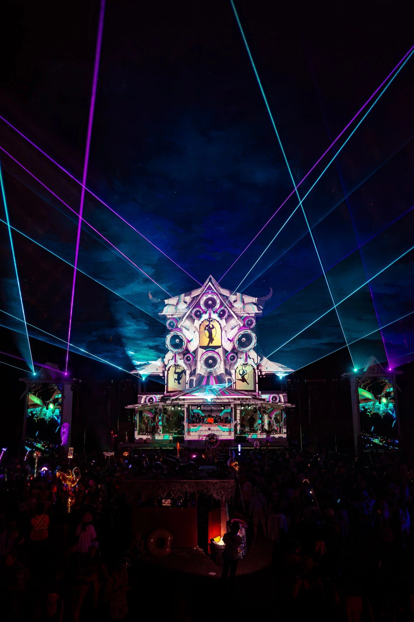 Festival photo by Part Time Famous: DJ stage lit up at night