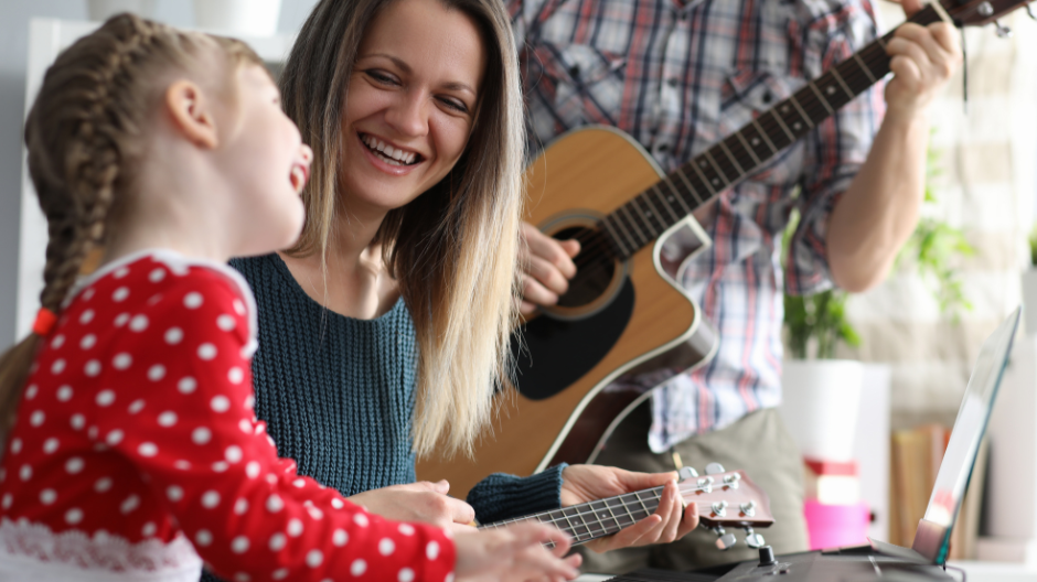 family playing guitar together