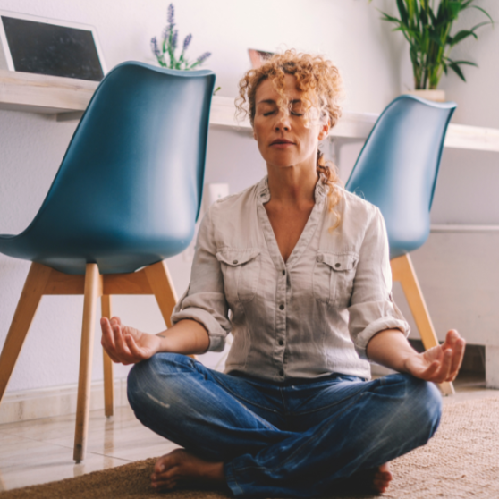 woman meditating at work