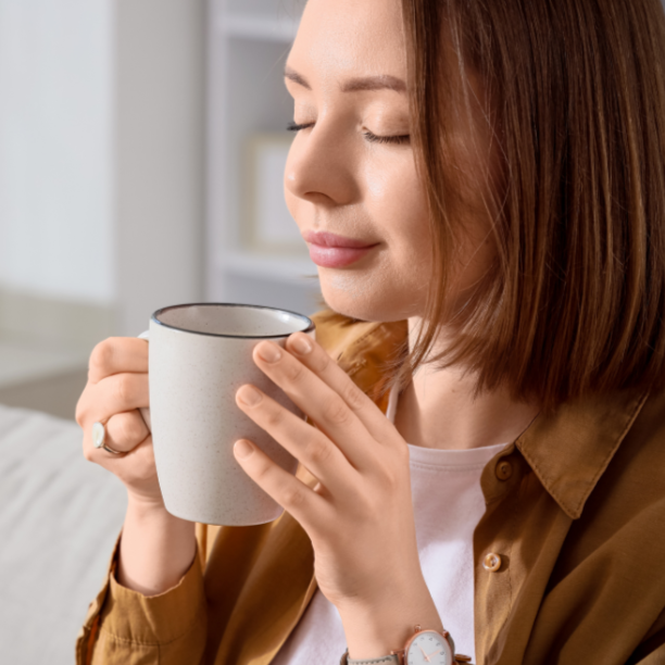 Mum enjoying a quiet moment smelling her coffee