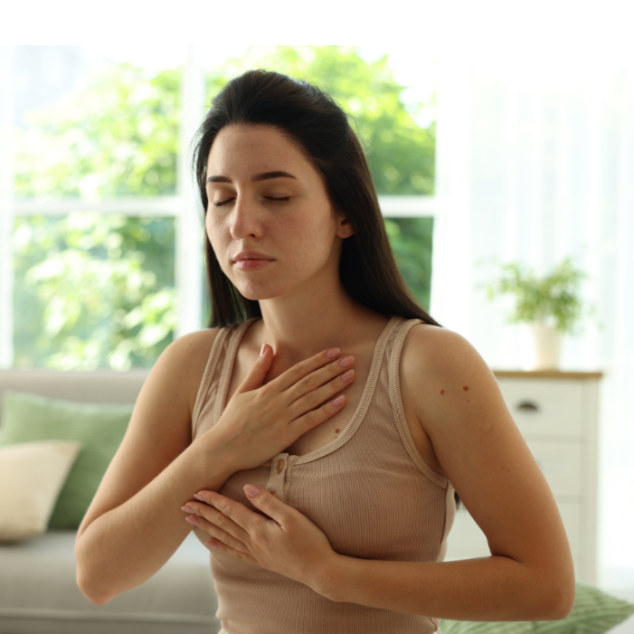 woman regulating herself through breathing