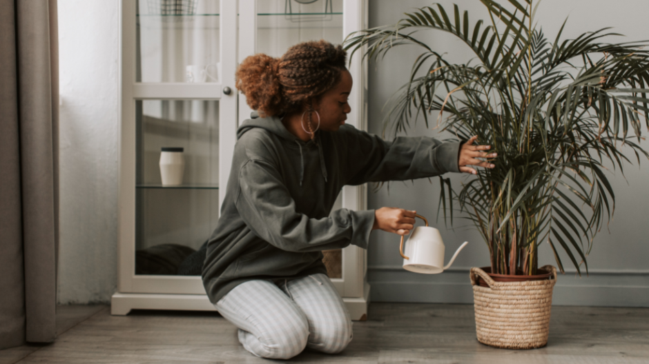 Mum enjoying watering the plants as part of her everyday routine