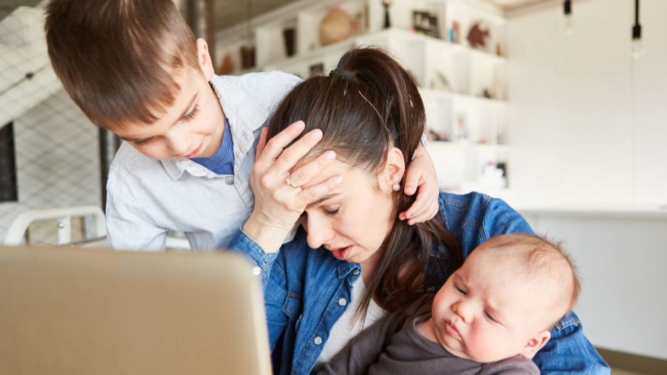 mother with two kids feeling exhausted