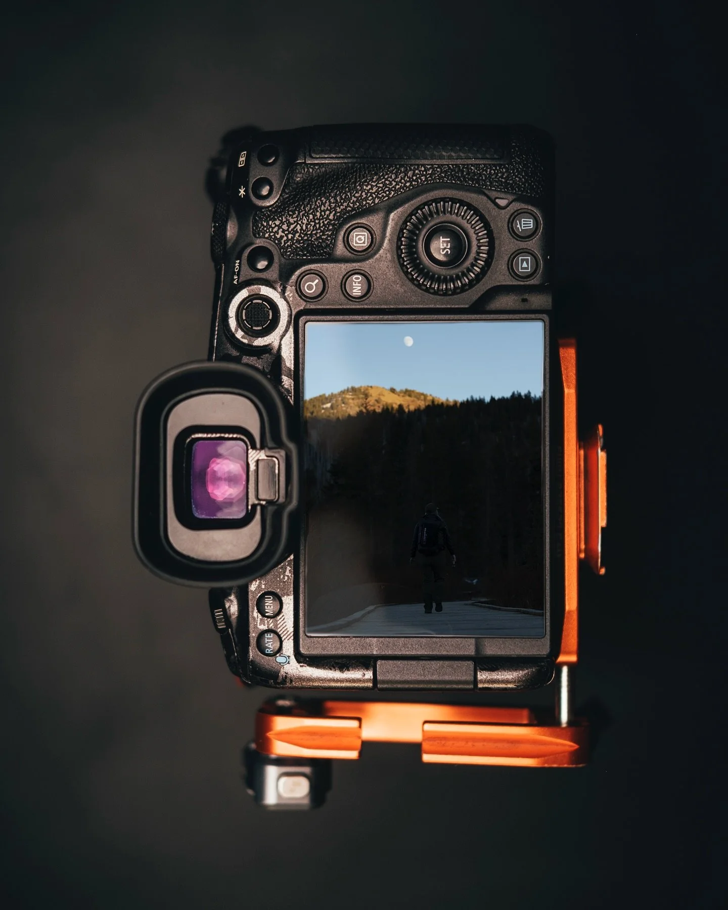 Back of my Camera
________________
While wrapping up some photos at dusk, I saw this photo with the pathway directly in line with a large and nearly full moon. In real life it looked fine, thanks to the abilities of our eyes and brain. But through th