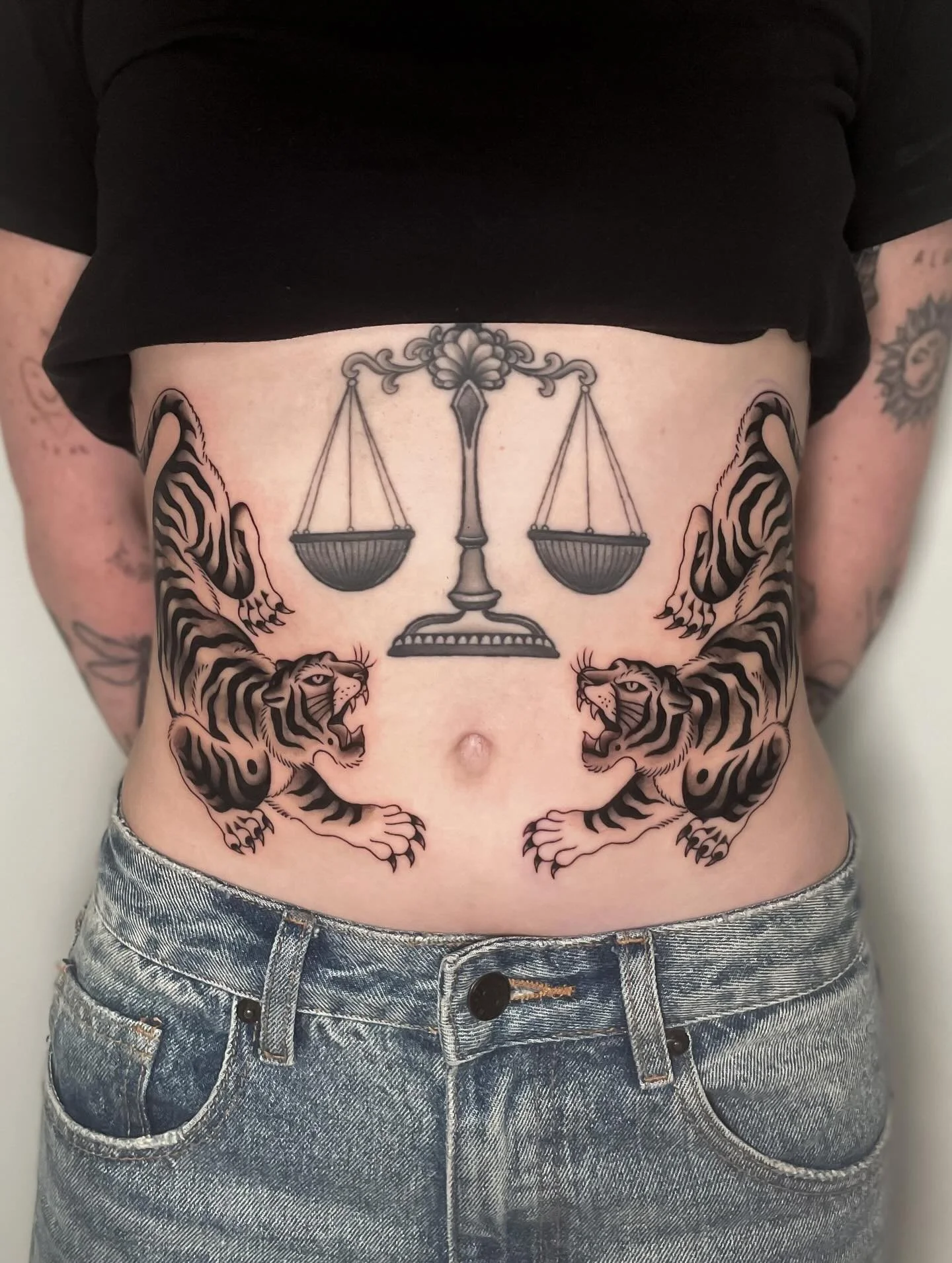 One shot symmetrical tigers for the lovely Riley! Thanks for probably being the toughest person I&rsquo;ve ever tattooed, you did great ★ ☆ ★ made at @wa.ink.tattoo