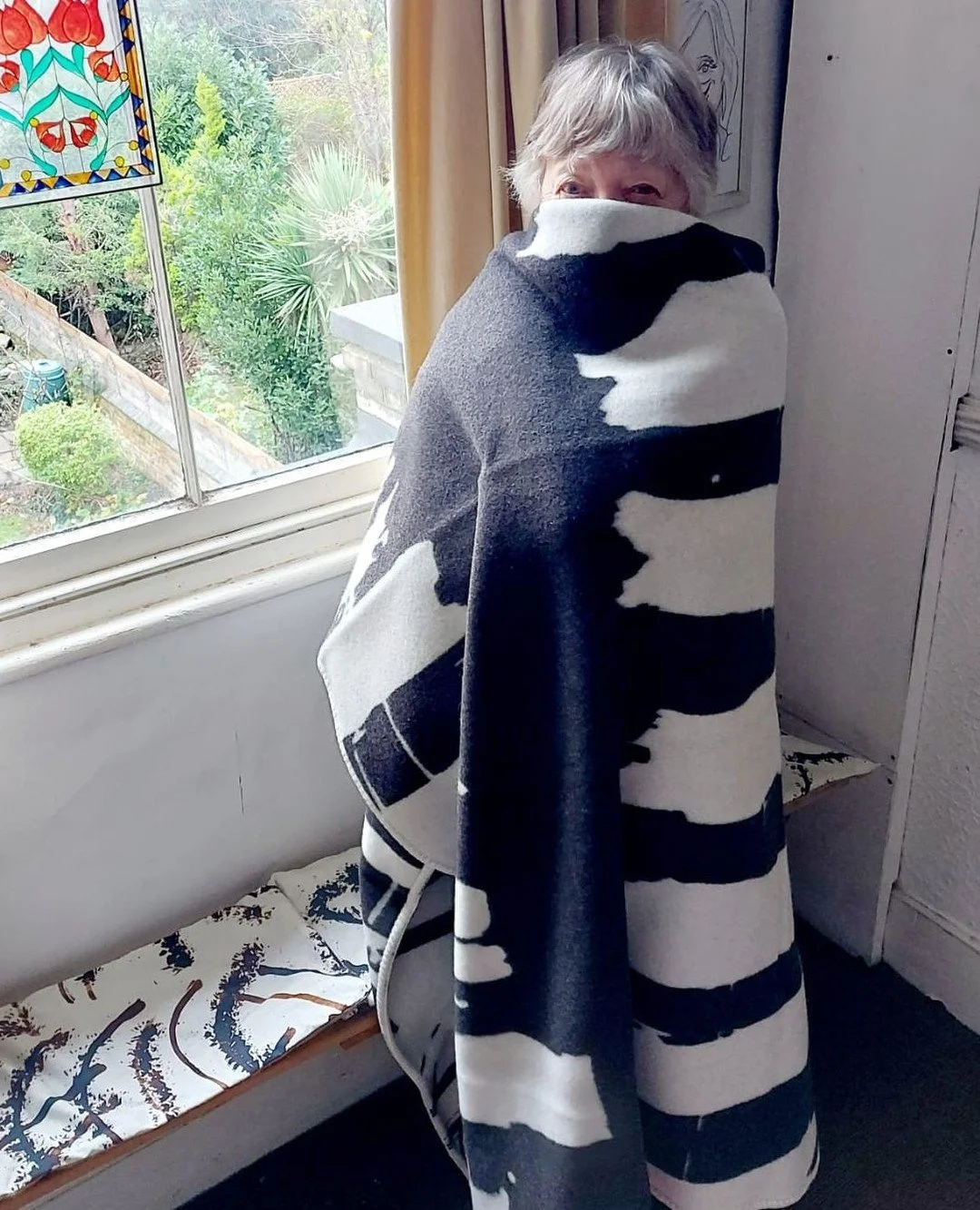 My dearest friend Sue, keeping warm in her Dancing Ledge blanket. ⁠
'Ok, that&rsquo;s it &ndash; I&rsquo;m not coming out from under this blanket until April at the earliest!'⁠
⁠
The response to the blankets has been truly wonderful:⁠
'The gorgeous d