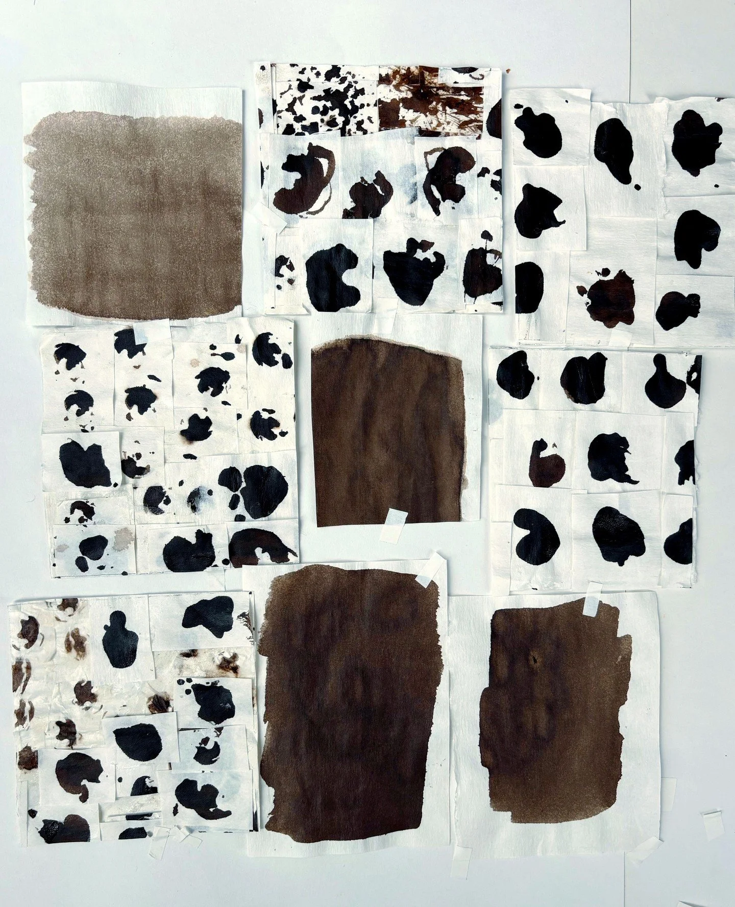 Collaging in my studio today &ndash; walnut ink marks from the land on paper made from recycled jeans. and walnut ink swatches.