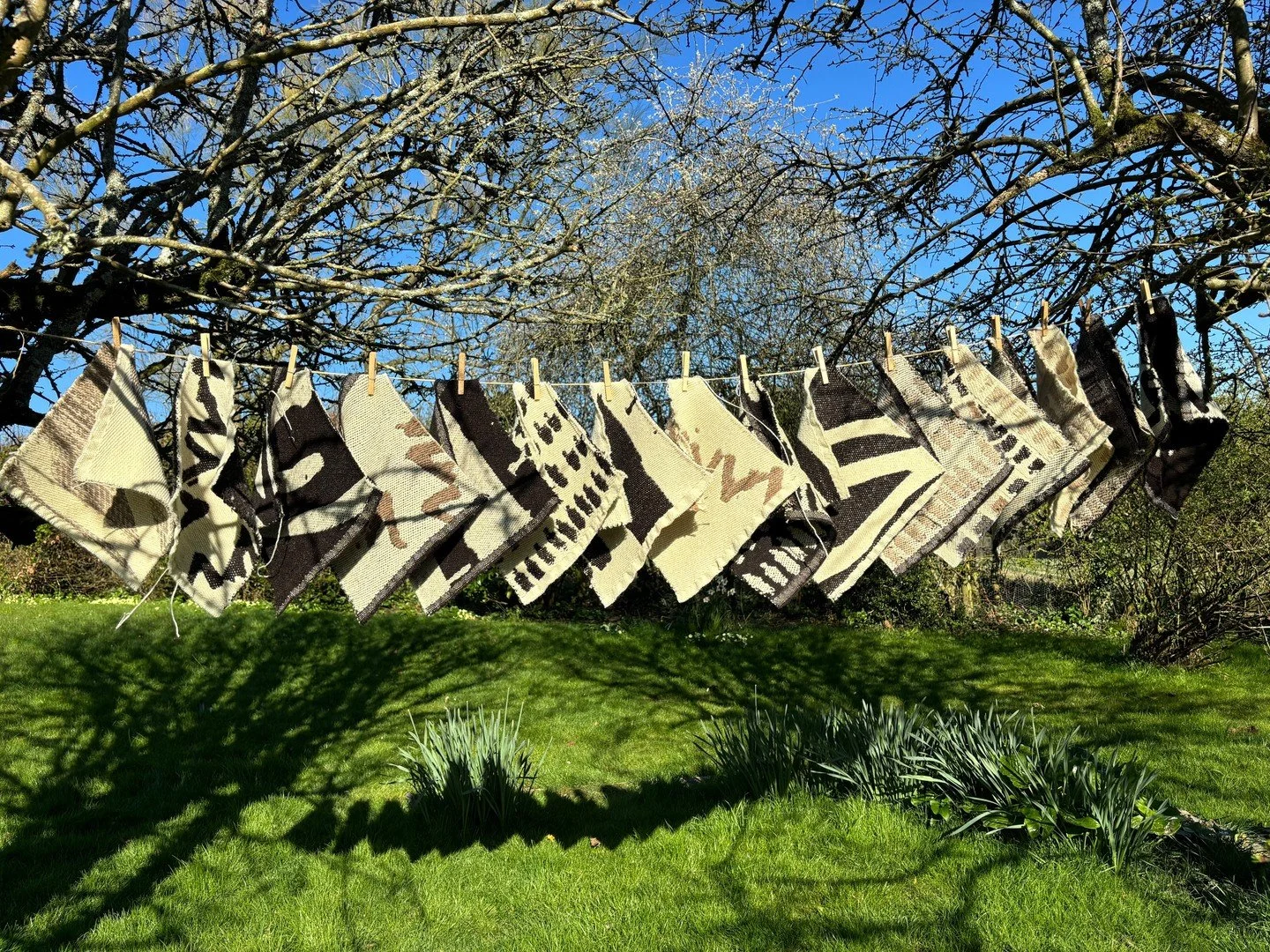 Beautiful jacquard weave samples woven for me by Kirsty McDougall ⁠
@ re_weave_⁠
The warm chalky tones of Dorset Down wool carry the movement of the mark, holding a memory of land and sea on both sides of the weave.⁠
The samples are the inspiration f