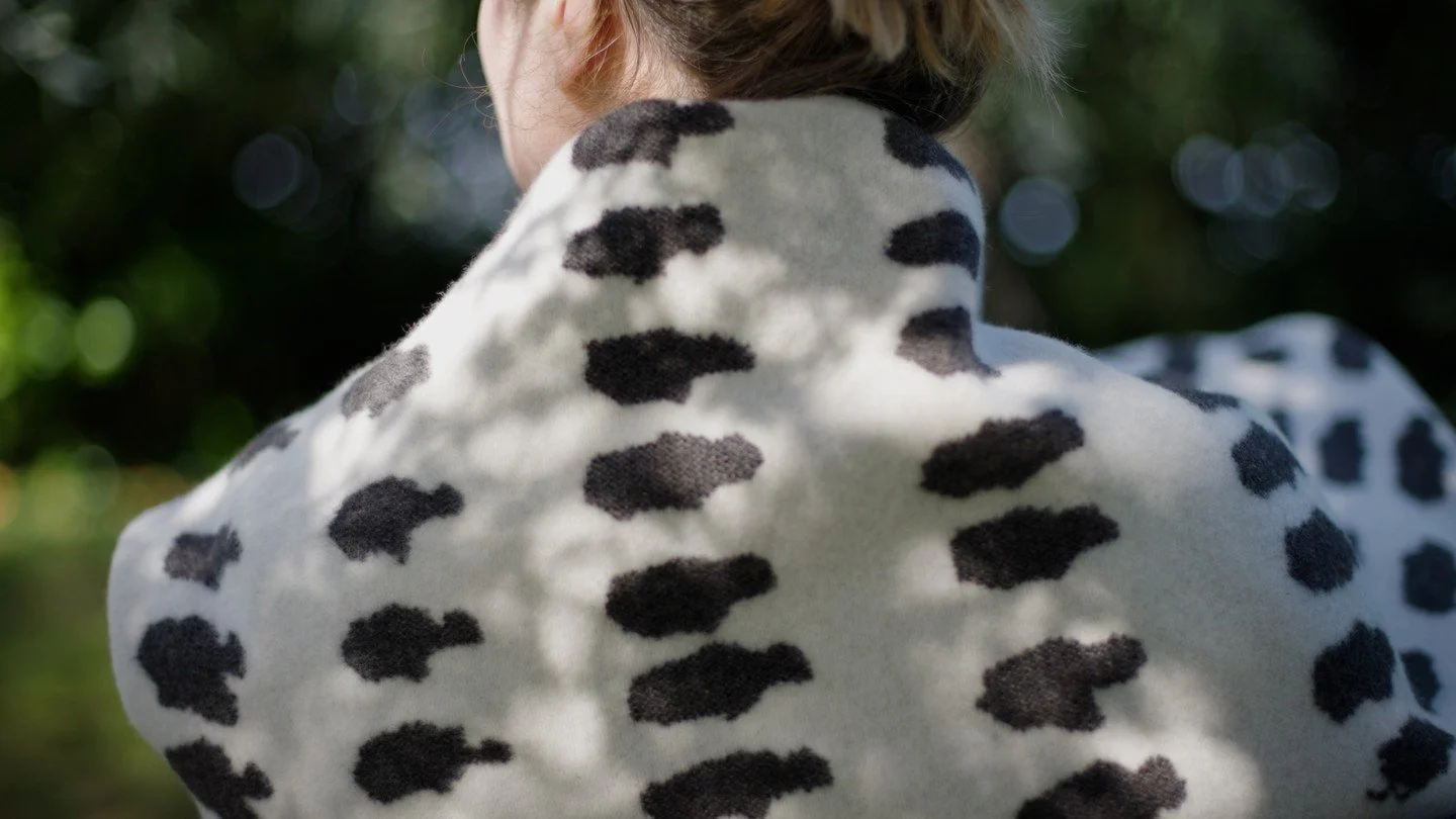 From meeting Ellen and her sheep @Tamarisk_Farm, to developing the sample designs @kirstymcdougallwoventextiles, and through the extraordinary craftsmanship of @AlexBeggofficial, our Hands in the Earth blankets came to life.⁠
Wrap yourself in deep wa