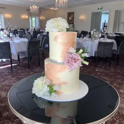 2 Tier Buttercream cake with brushed rose gold accent