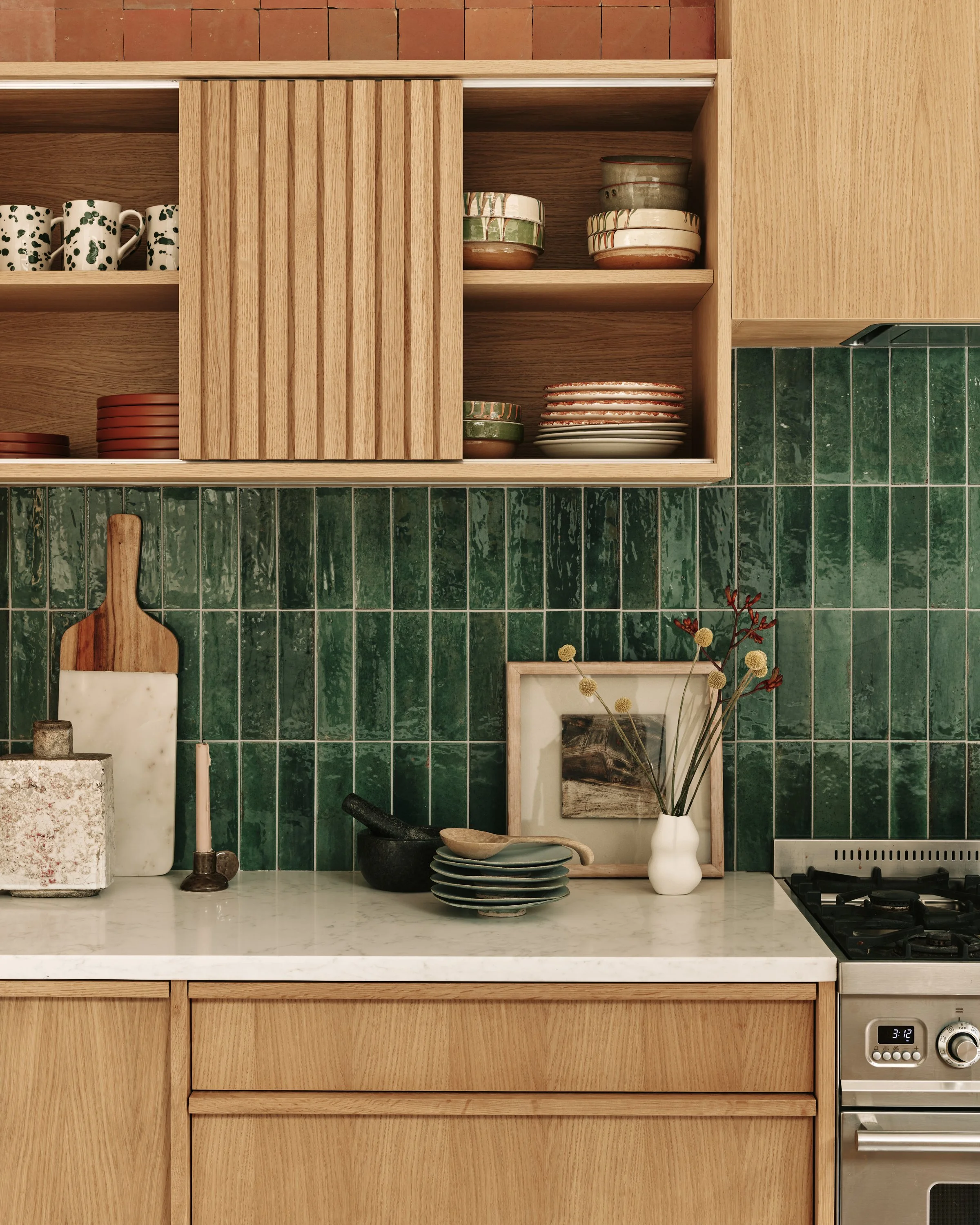 Bespoke marble kitchen island and architectural joinery design in an open-plan extension