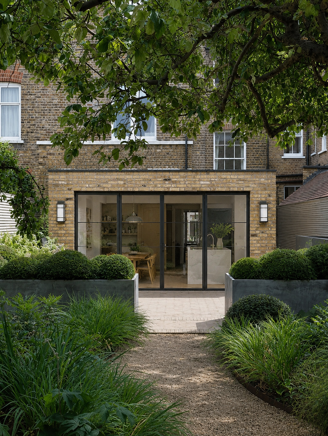 Kitchen extension London garden view with sliding door