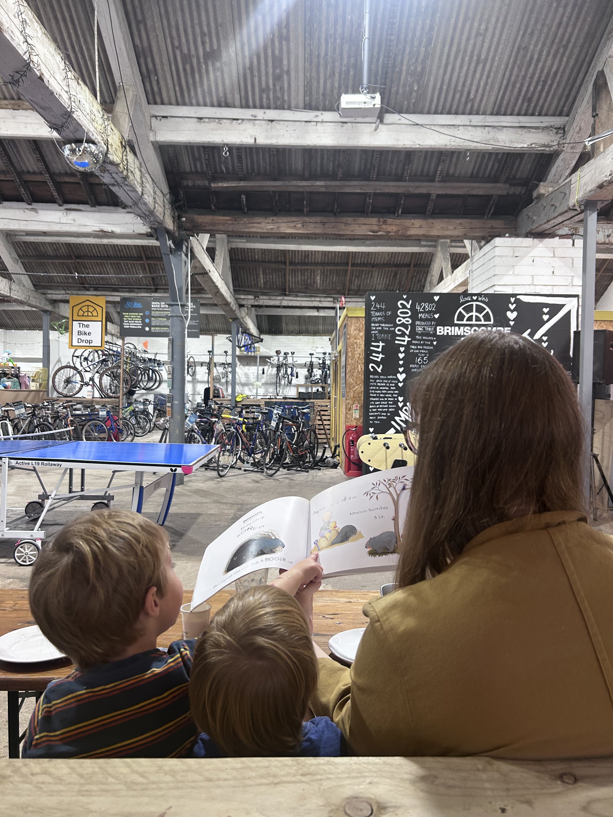 Children and families at Brimscombe Mill Kids Book Fest near Stroud