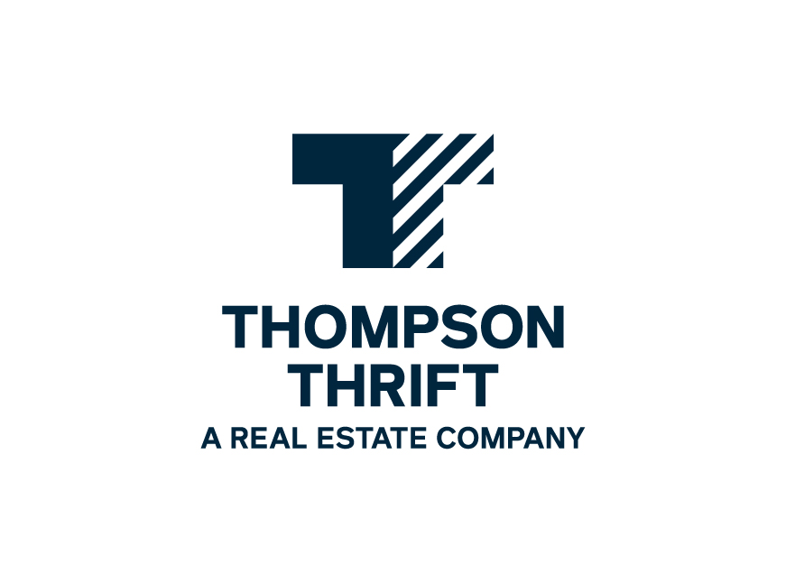 Thompson Thrift logo with a stylized 'T' symbol and the company name, labeled as a real estate company.