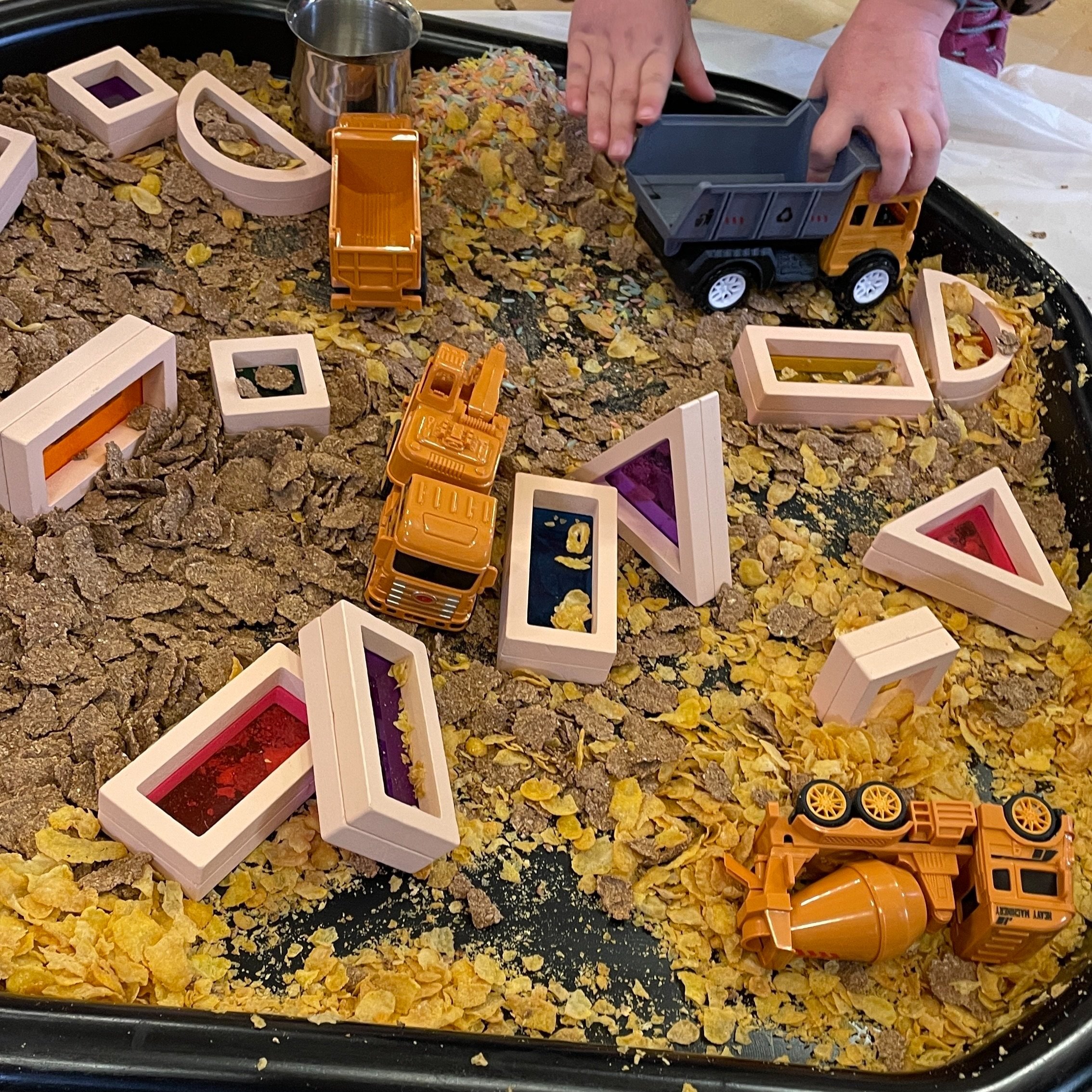 “Children with disabilities and additional needs taking part in a messy play and sensory play session organized by a local special needs support group in Warwickshire. The inclusive environment encourages children with autism, ADHD, and sensory proce