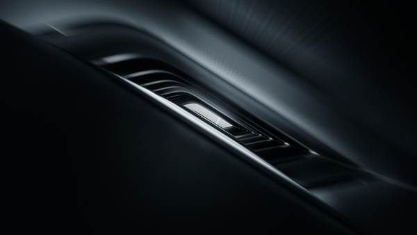 Dark F1 car body panel close-up, Formula 1 2026 opening titles, 3D production by DissEmbargo