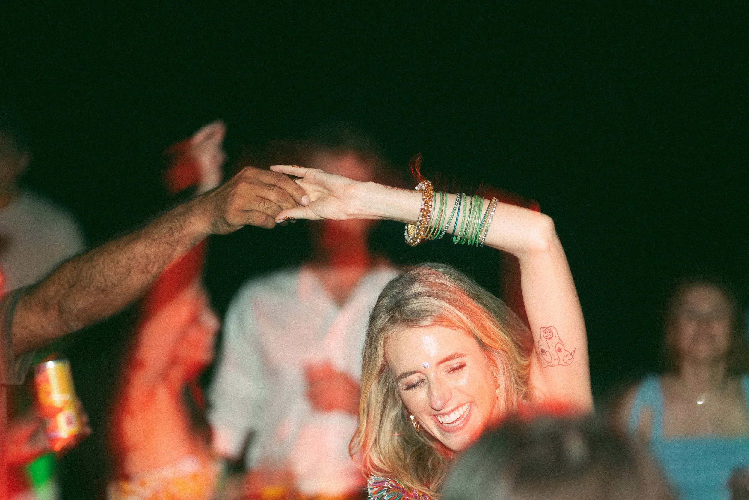 the bride and her father in law on the dance floor 