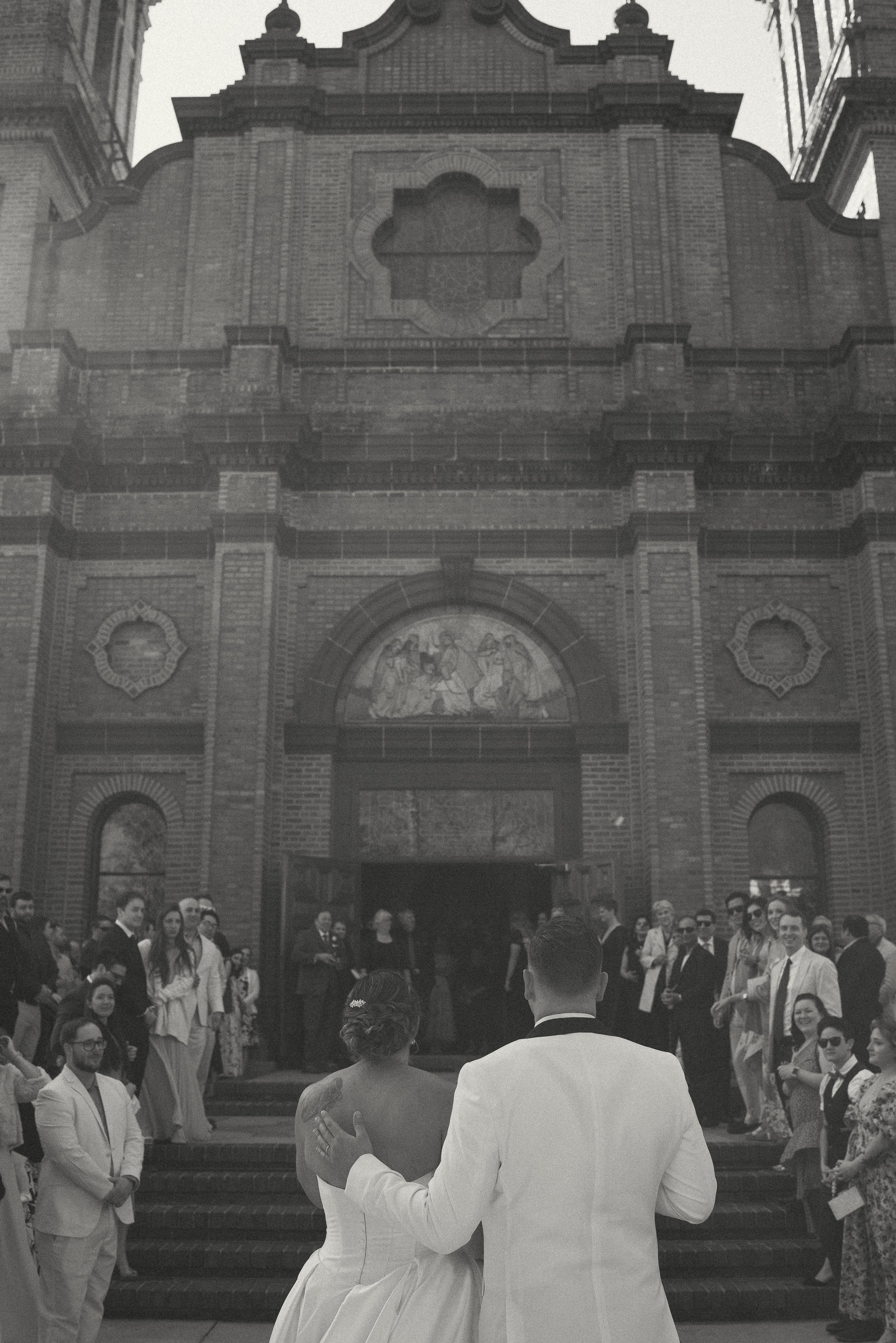 gorgeous black and white photo from the bride and groom's perspective on their wedding day, photographed by one of the best wedding photographers in wilmington, nc