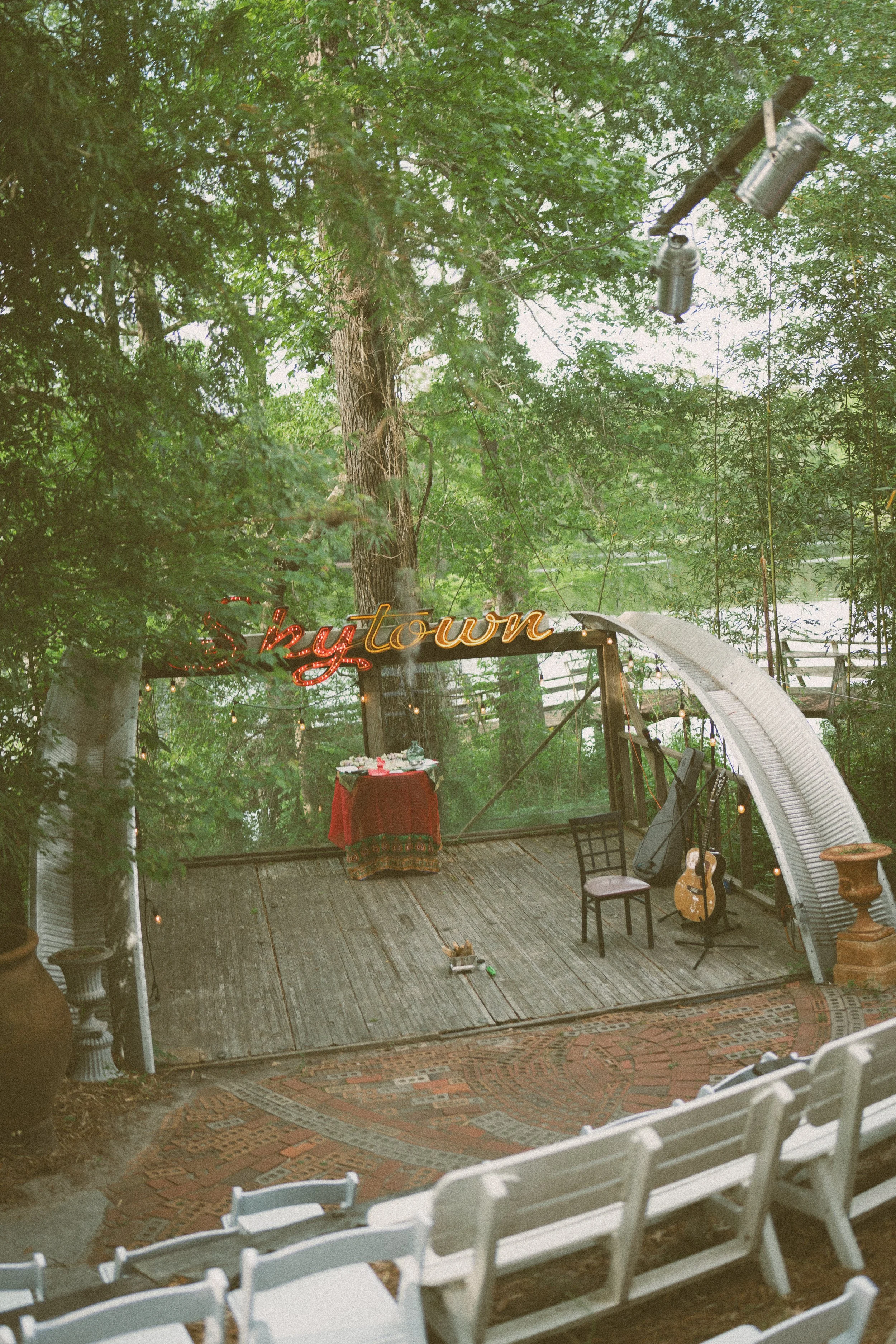 this is a photo of the ceremony area, with the river in back of it, and the coliseum type seating looking down upon it