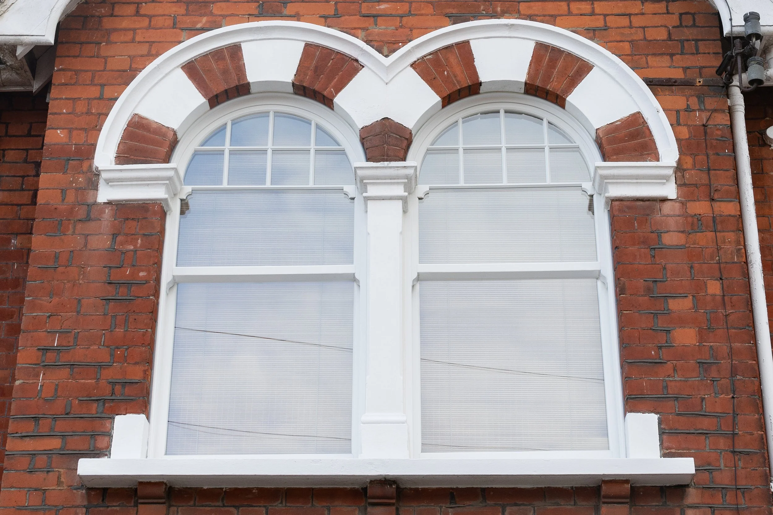 Bespoke Windows sash windows Victorian window with handmade curved heads