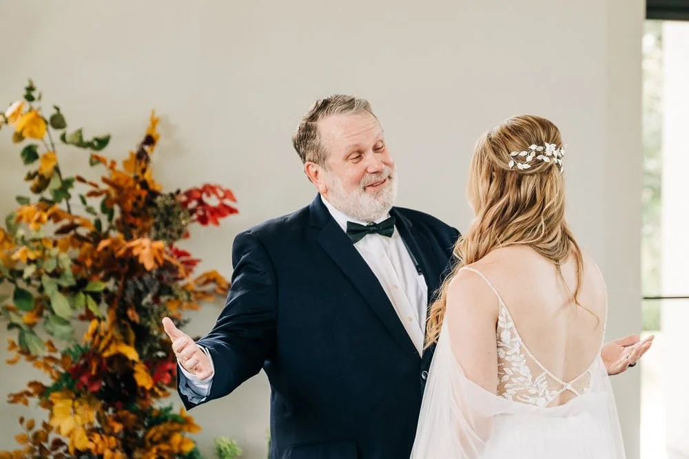 041-microwedding dad first look .jpg