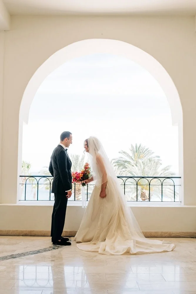 114-bride groom first look hilton los cabos.jpg