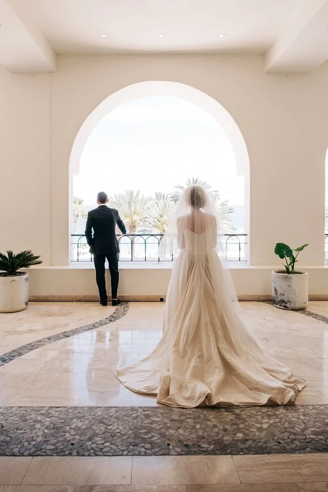 108-bride groom first look hilton los cabos.jpg