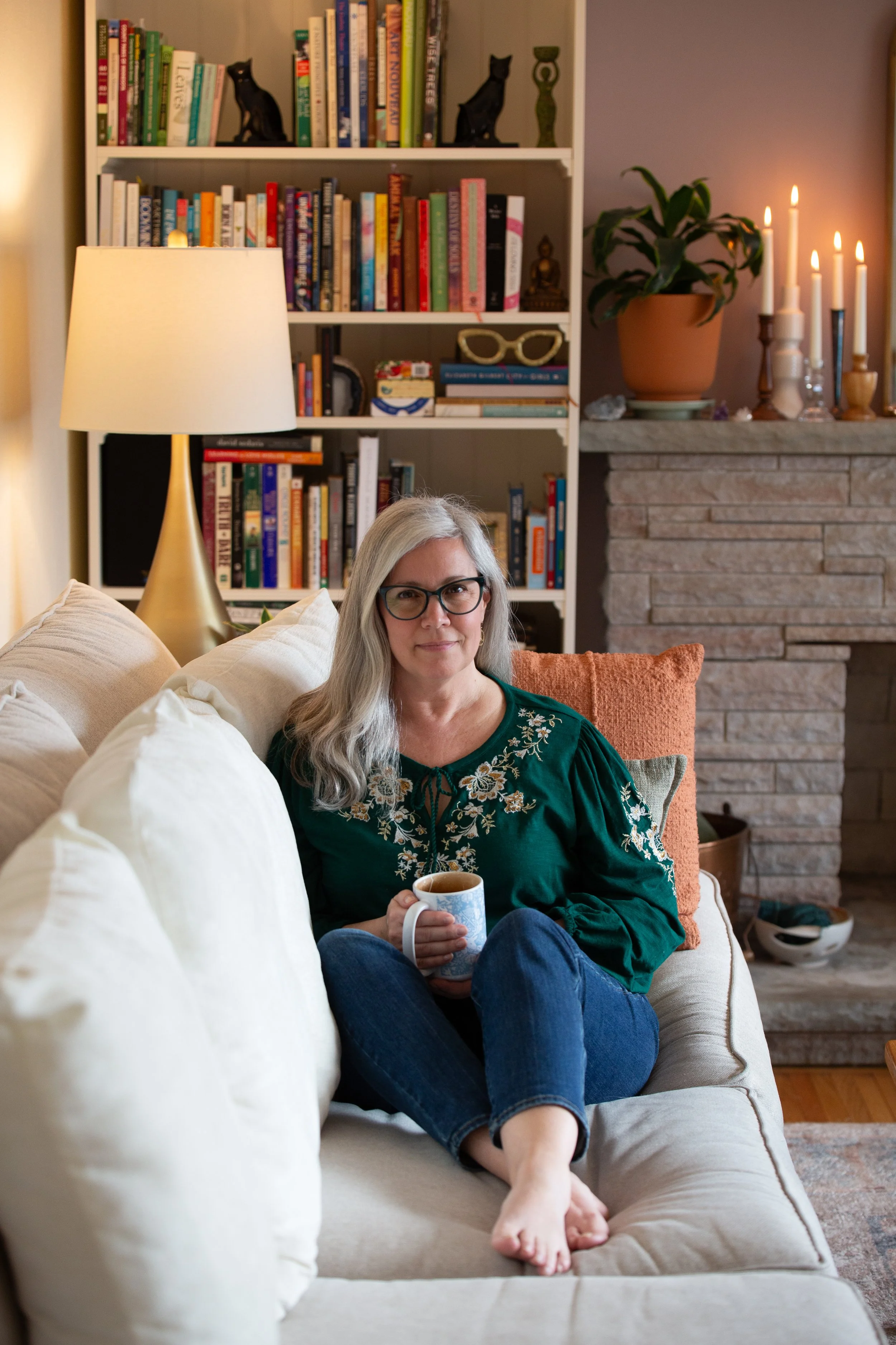 Stages of monarch butterfly against bright green background